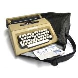 An Olivetti portable 'Letterer 25' typewriter with literature, in original carry bag