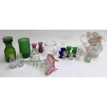 Mixed lot of glassware to include 12 eye baths, cut glass jug, vintage glass jars and bottles,