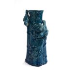A Bretby Pottery (?) Aesthetic movement vase, depicting two birds perched upon bamboo, with blue
