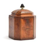 A George III marquetry and parquetry tea caddy, of canted square form, with lined interior and