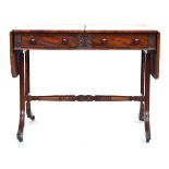 A 19th century mahogany sofa table, having two frieze drawers and two blind frieze drawers, the