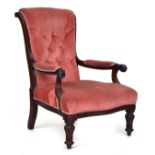 A 19th century button back open armchair, scrolling arms, on carved front legs