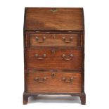 A small 19th century mahogany bureau, the fall front above two short over two long drawers, on