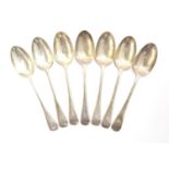 A set of seven Old English pattern table spoons, the terminals monogrammed 'JEPC', by Garrard & Co