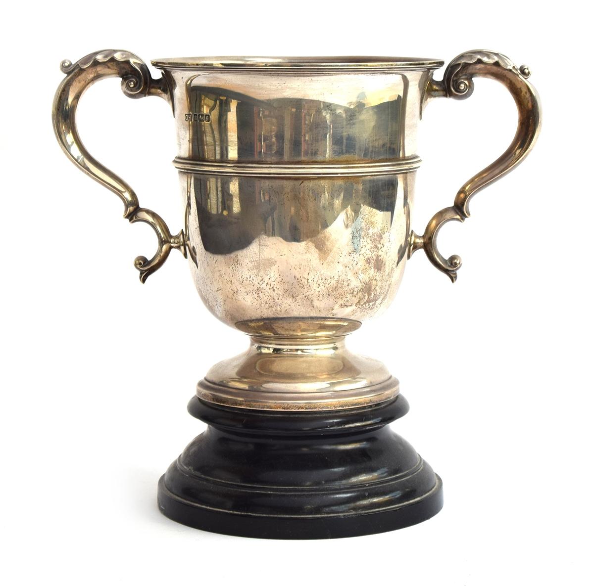 A very large twin handled silver trophy cup by Harrison Brothers & Howson (George Howson),