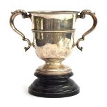 A very large twin handled silver trophy cup by Harrison Brothers & Howson (George Howson),