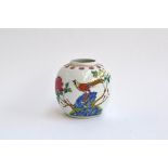 A Chinese ginger jar, painted in polychrome with images of a rooster and a chrysanthemum, marked