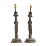 A pair of figural brass table lamps in the form of women in classical dress, each 28cm high