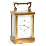 A London Clock Co. brass cased carriage clock with 11 jewel movement by Fema of London, 11cm high