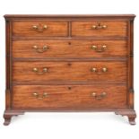 A Georgian mahogany chest of two short over three graduating drawers, moulded edge top, the
