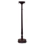 An early 20th century mahogany coat stand with brass fittings, 178cm high