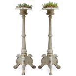 A pair of Coalbrookdale style Victorian cast iron pot stands, 123cm high
