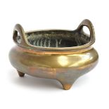 A large brass Chinese censer, seal marks to base, 23.5cm diameter, approx. 5kg