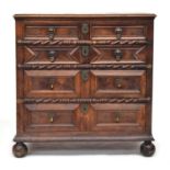 A Charles II oak geometric chest of drawers, 86cm wide, 52.5cm deep, 88cm high