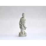 A Chinese blanc de Chine porcelain figure of Guanyin, the Bodhisattva of Compassion (af), 36.5cm