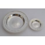 Two silver Armada/alms dishes by Richard Lawton Ltd, London 1990 and 1993, the larger 20cm diameter,