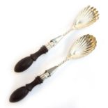 A pair of Victorian silver salad servers by John Grinsell & Sons, Birmingham 1890, of shell form,