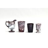 Four pieces of Victorian Davidson purple malachite slag glass, to include two tumblers, a jug and