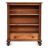 An Edwardian mahogany bookshelf with single drawer, on turned feet, 86cm wide, 30.5cm deep, 104cm