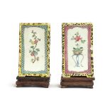 A pair of Chinese famille jaune rectangular brush pots, each panel decorated with a spray of