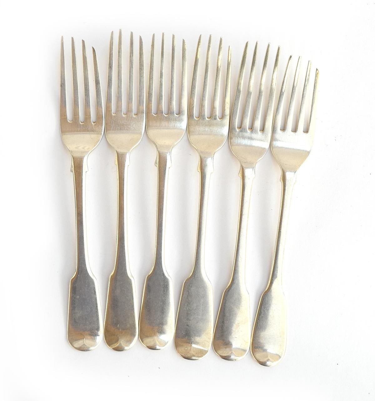 A set of six Georgian fiddle pattern forks, various makers including William Eaton, Richard Crossley