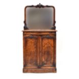 A Victorian burr walnut chiffonieur, bookmatched top, the cupboard doors with applied carved