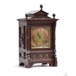 A late 19th century German oak cased mantel clock, by Lenzkirch, architectural case with pediment