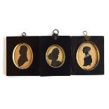 Three late eighteenth century silhouettes, oval glass with black lacquered frames, two heightened in
