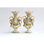 A pair of Coalbrookdale style two-handled porcelain landscape vases with encrusted floral decoration