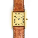 A Must de Cartier silver gilt ladies tank wristwatch Blued hands, black Arabic numerals, cream dial,