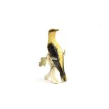 A Karl Ens porcelain figurine of a golden oriole, 22cm high, marked to base