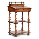 A Victorian walnut whatnot cum davenport desk, the top with a hinged galleried compartment fitted