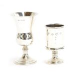 Two modern silver shot glasses, the smaller 7.5cm high, Birmingham 1971 and 1984, 4oz