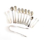 A small collection of silver teaspoons and sugar tongs, to include a William Bateman I George III