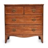 A bow front mahogany chest of two short over two long cross banded drawers, on swept bracket feet,
