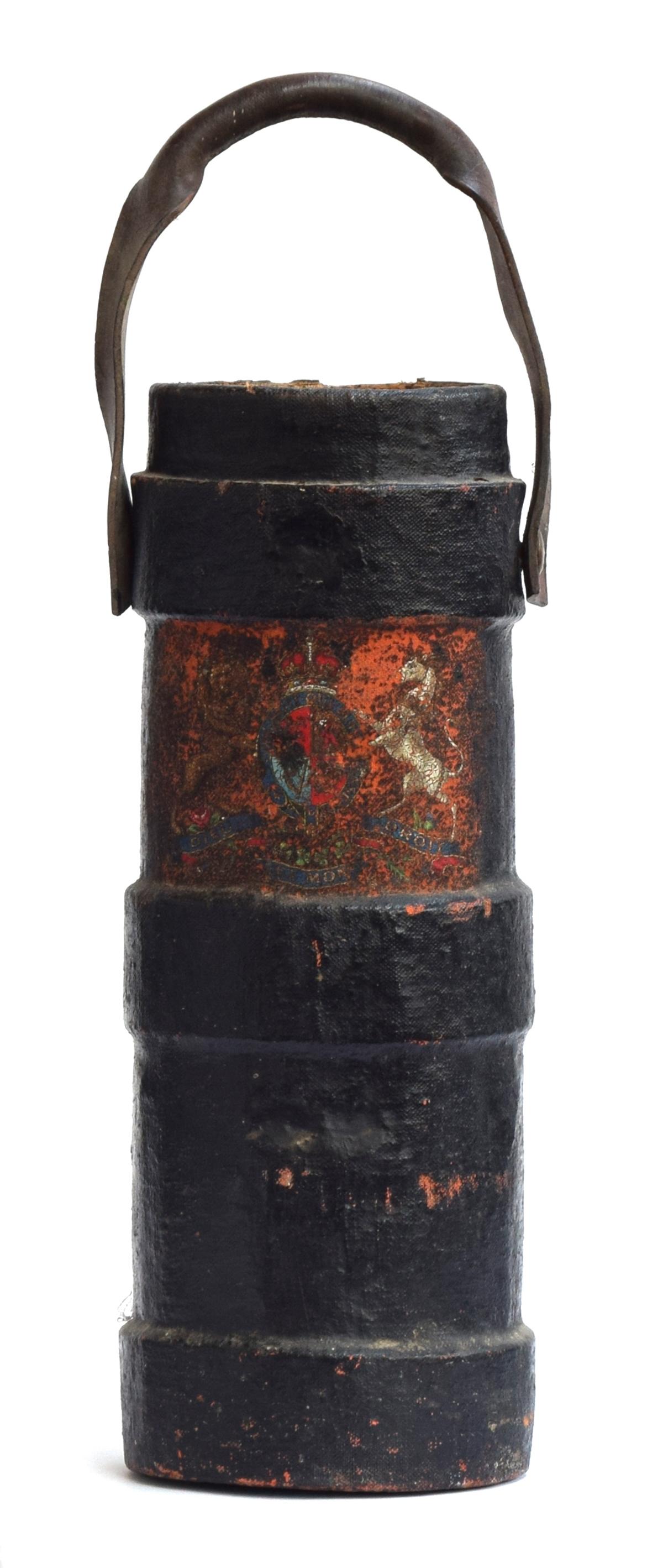 An early leather shell carrier with loop handle, decorated with armorial crest 'Dieu et mon