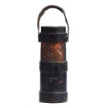 An early leather shell carrier with loop handle, decorated with armorial crest 'Dieu et mon