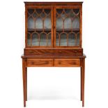 A Regency and later mahogany lady's writing desk of good patination, with glazed shelves and two