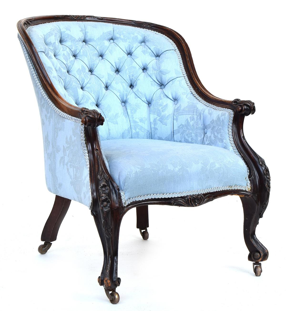 A button back salon chair, curved top rail, with carved supports on scrolling carved legs, with