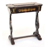 A 19th century Chinese export black lacquered and parcel gilt sewing table, the lid enclosing