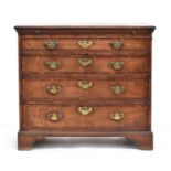 An unusual Victorian chest of drawers, moulded top over blind drawer and a further three