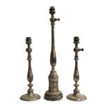 A pair of plated table lamps of baluster form, 31.5cm high, together with one other, 47.5cm high