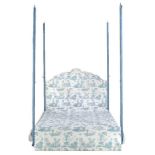 A modern tester bed, hung with turquoise and white Chinoiserie drapes, counter pain and headboard,