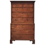 An early 19th century mahogany chest on chest, dentil cornice above two short over three long