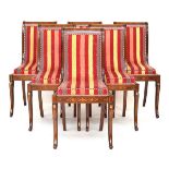 A set of six Louis Philippe mahogany and marquetry inlaid side chairs, circa 1840, upholstered in
