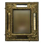 A 20th century Venetian mirror with gilt metal decoration and bevelled glass plates, 70x85cm