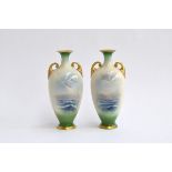 A pair of Royal Worcester twin handled baluster vases, hand painted with scenes of a boat at sea,