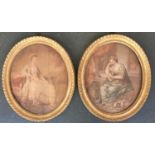 Two framed prints in oval gilt frames, depicting ladies at rest, each 30x25cm