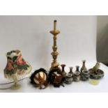 A mixed lot of Continental studio pottery, ostrich eggs, an altar style lamp base, etc