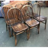 A set of six stickback kitchen chairs, shaped seats and H stretchers; together with two similar